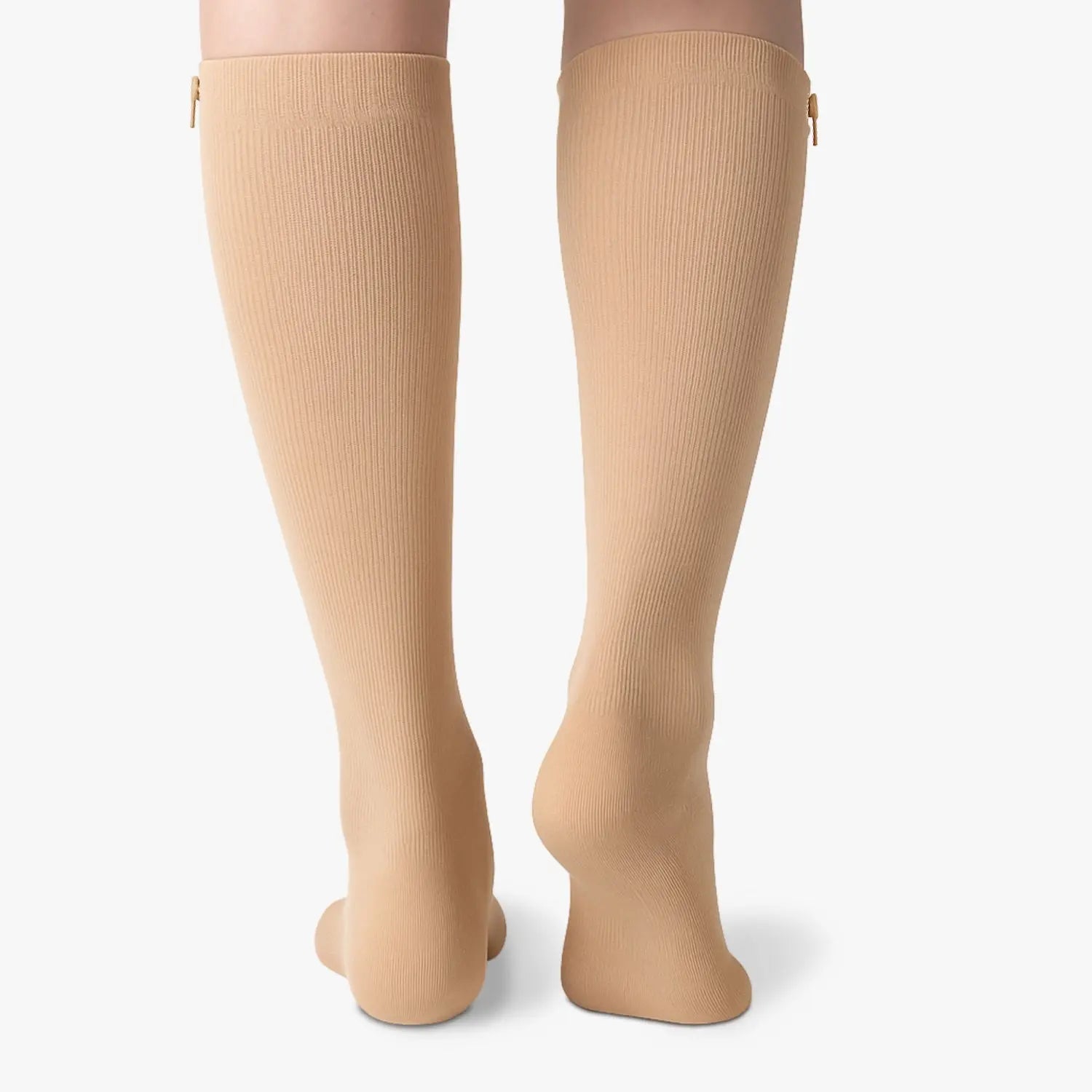 Chaussettes de contention à zip et pieds ouverts beiges classe 2 portées, vue de dos